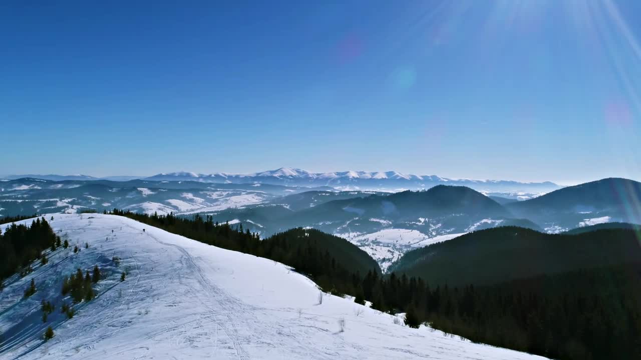 Download Stock Video Flying Over A Ski Resort With A Panoramic View Live Wallpaper For PC