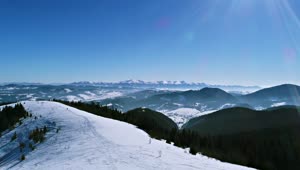 Stock Video Flying Over A Ski Resort With A Panoramic View Live Wallpaper For PC