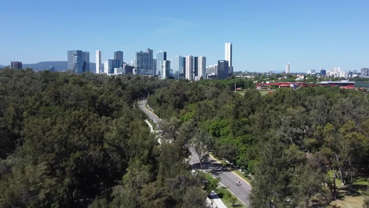 Download Stock Video Flying Over A Natural Area Of A Big City Live Wallpaper For PC