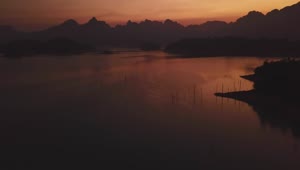Stock Video Flying Over A Lake During Sunset Live Wallpaper For PC