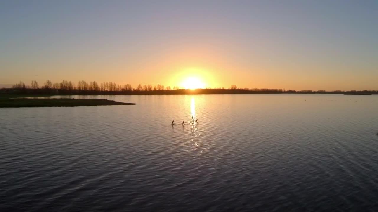 Download Stock Video Flying Over A Lake At Sunset Live Wallpaper For PC