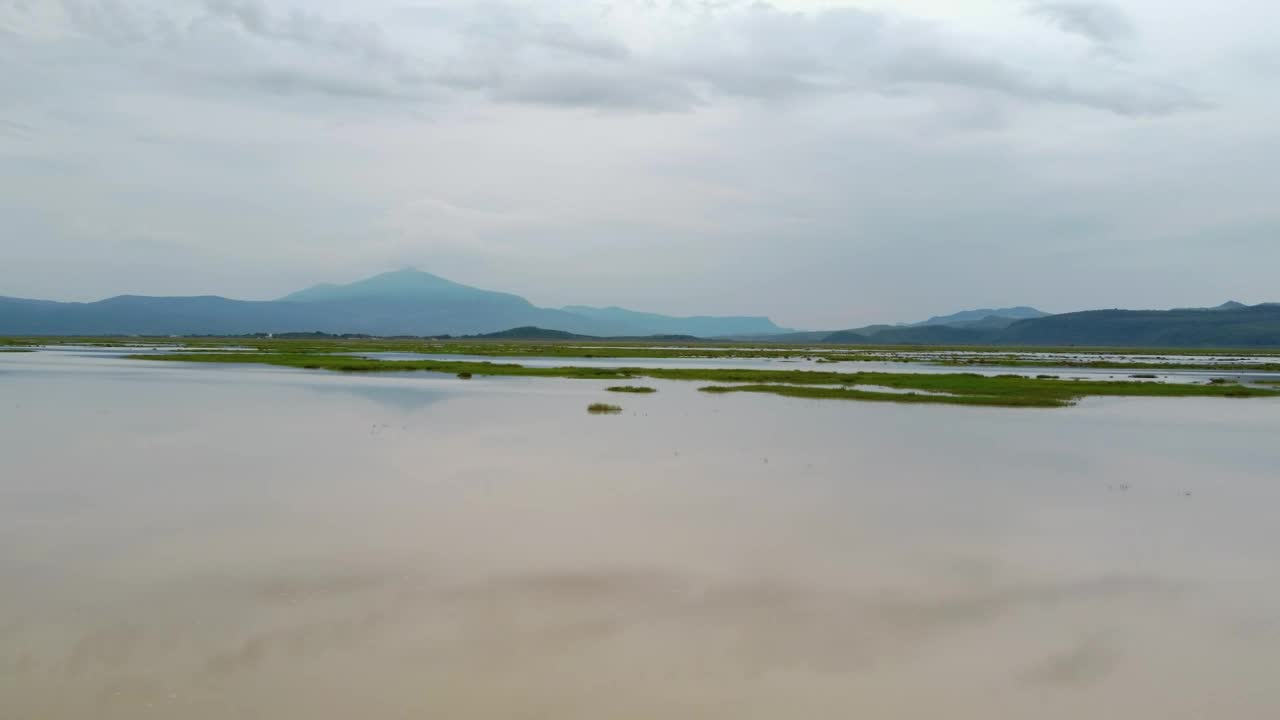 Download Stock Video Flying Over A Huge Plain Covered In Water Live Wallpaper For PC