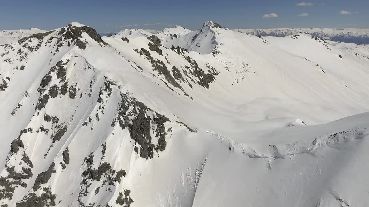 Download Stock Video Flying Above The Snowy Mountains Live Wallpaper For PC