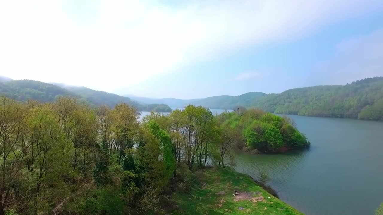 Download Stock Video Flying Above A Calm Lake Live Wallpaper For PC