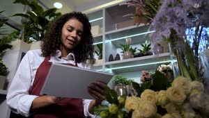 Stock Video Florist Smiling As She Works In Her Store Live Wallpaper For PC