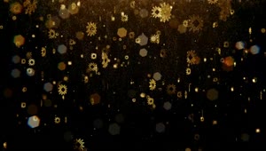 Stock Video Flickering Golden Snowflakes On Black Background Live Wallpaper For PC