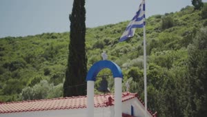 Stock Video Flag Of Greece Waving On The Dome Of A Church Live Wallpaper For PC