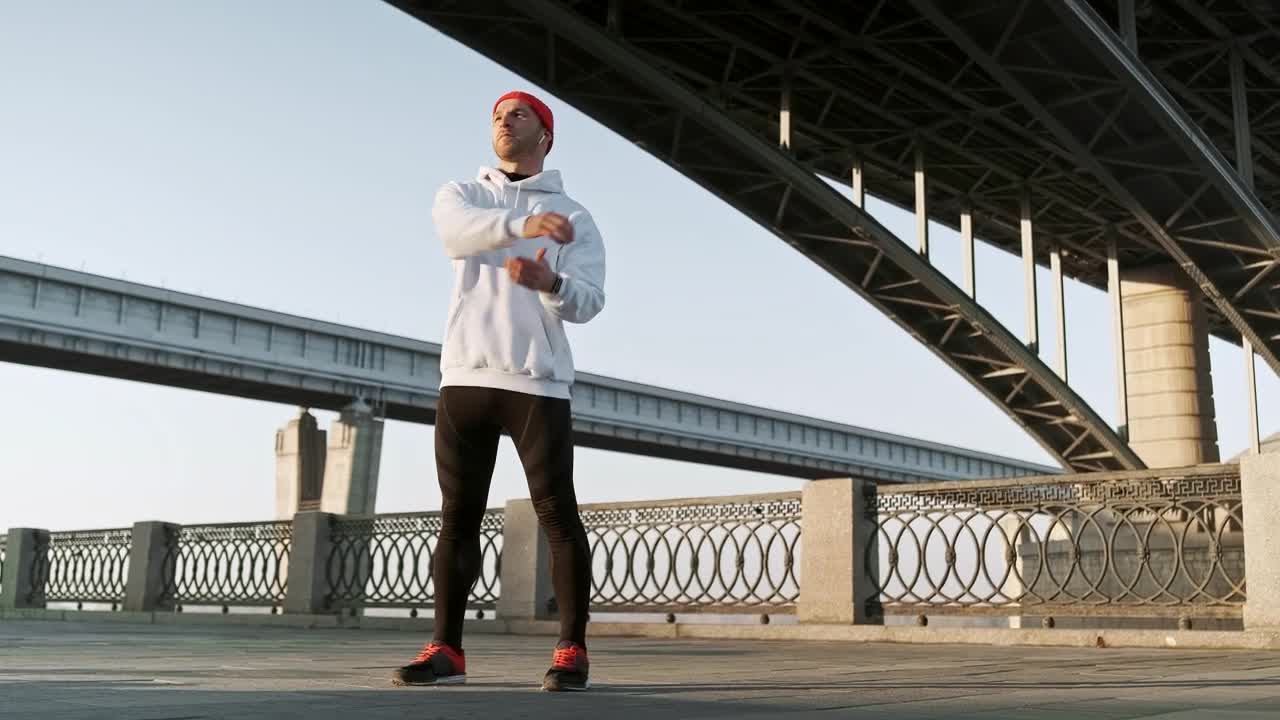 Download Stock Video Fitness Man Preparing For An Urban Training Live Wallpaper For PC