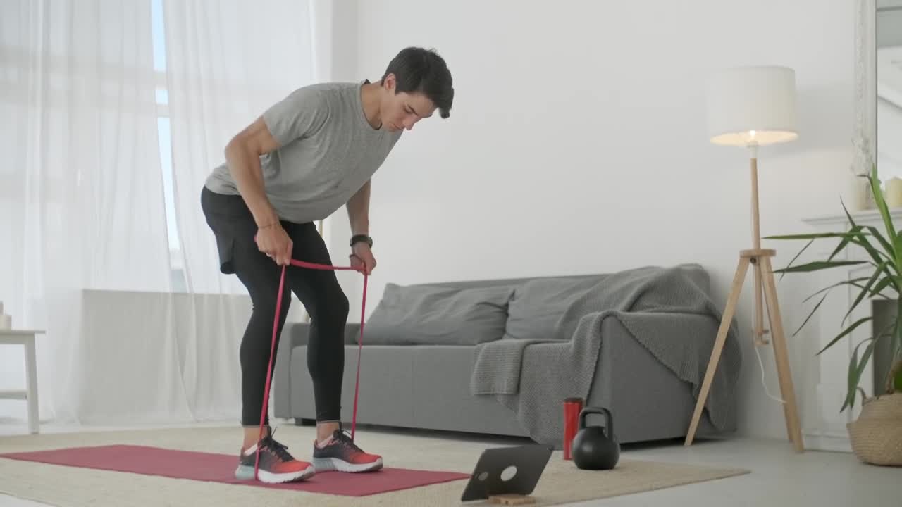 Download Stock Video Fitness Man Exercising With Elastic Bands Live Wallpaper For PC