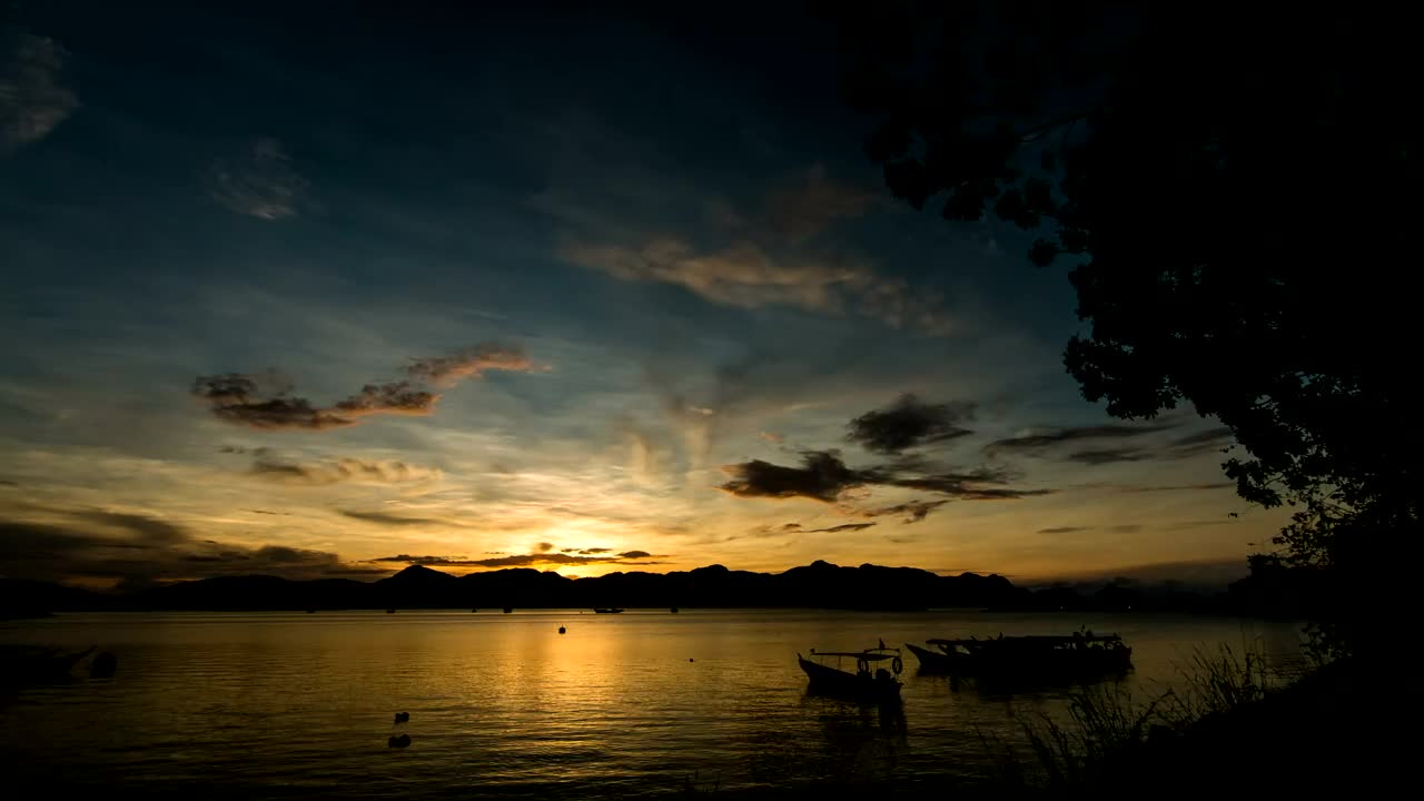 Download Stock Video Fishing Boats Silhouetted During Sunrise Live Wallpaper For PC