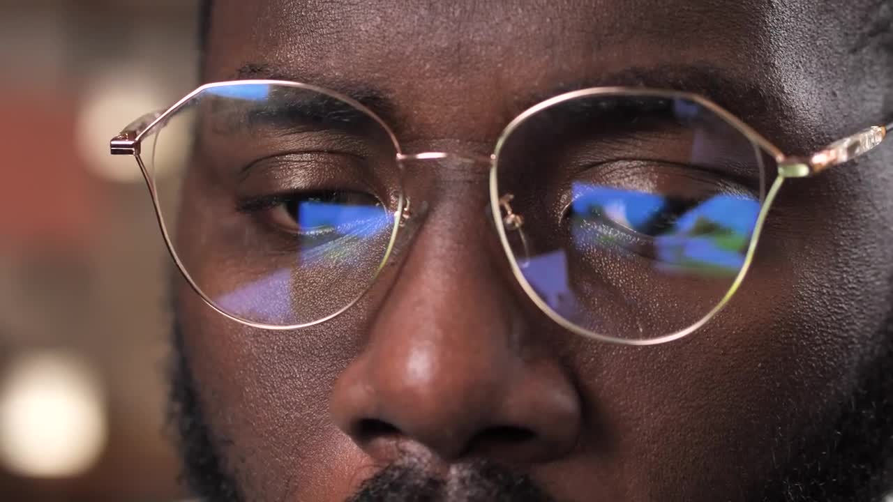 Download Stock Video Film Reflected On A Pair Of Glasses Live Wallpaper For PC