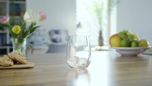 Stock Video Filling A Glass With Sparkling Water In The Kitchen Table Live Wallpaper For PC