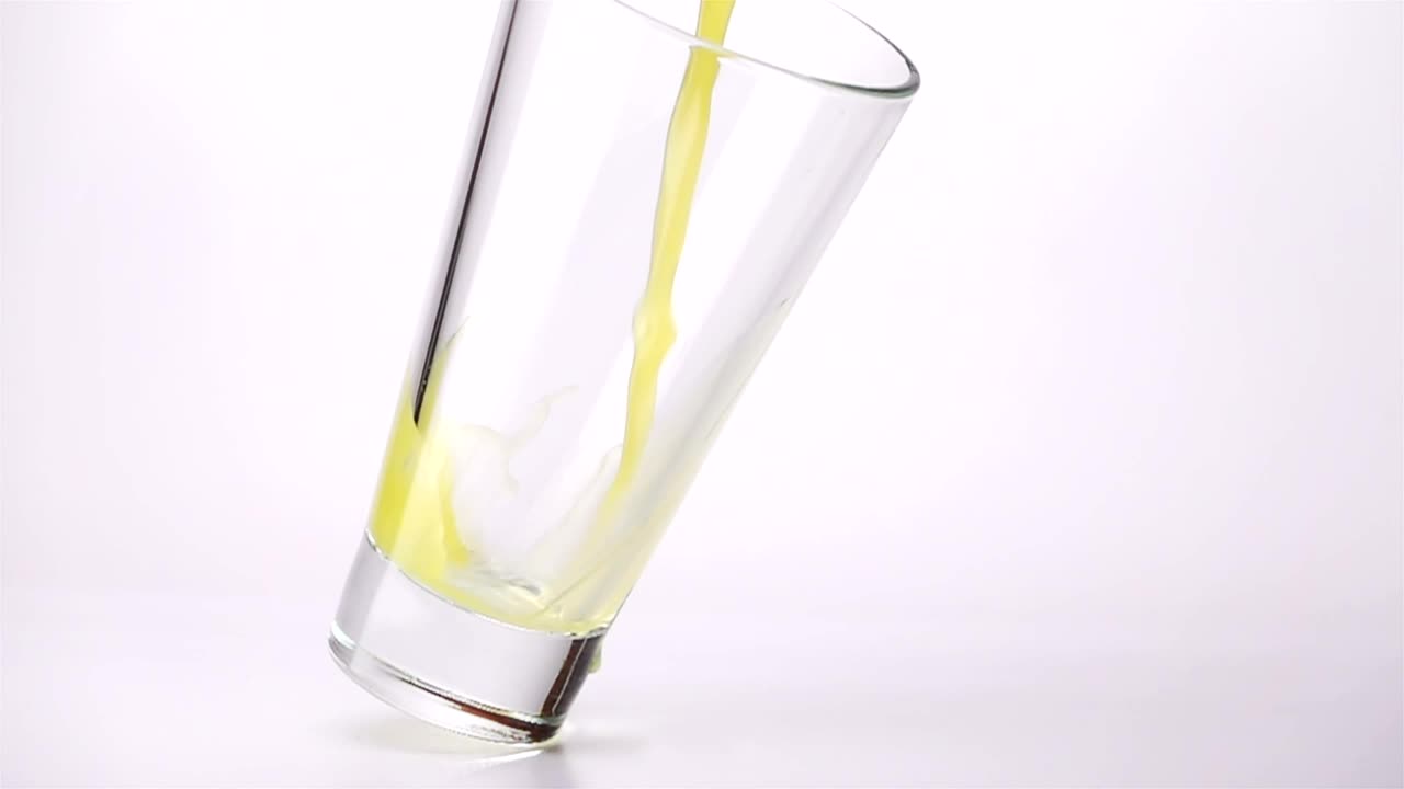 Download Stock Video Filling A Glass With Juice On A White Background Live Wallpaper For PC