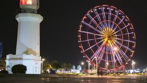 Stock Video Ferris Wheel Near The Lighthouse At Night Live Wallpaper For PC