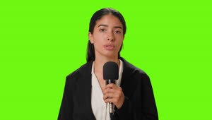 Stock Video Female Reporter Reporting With Microphone In Hand On A Chroma Live Wallpaper For PC