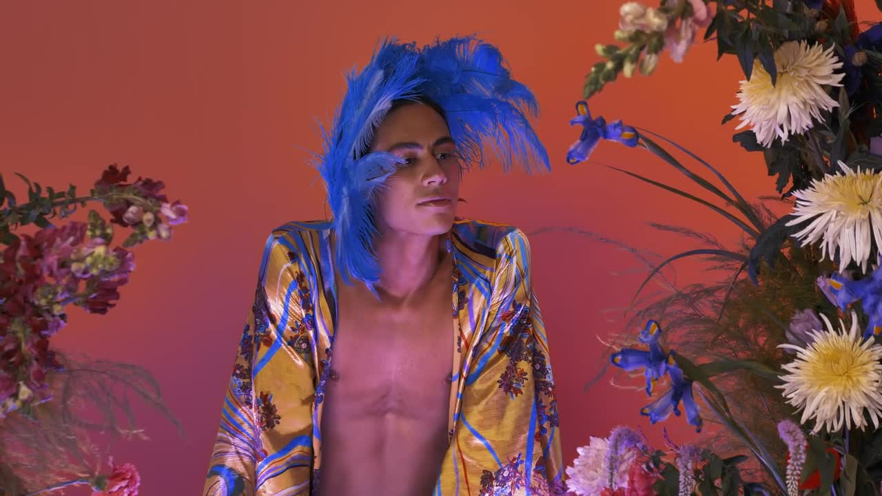 Download Stock Video Female Gay Man Surrounded By Many Flowers Live Wallpaper For PC