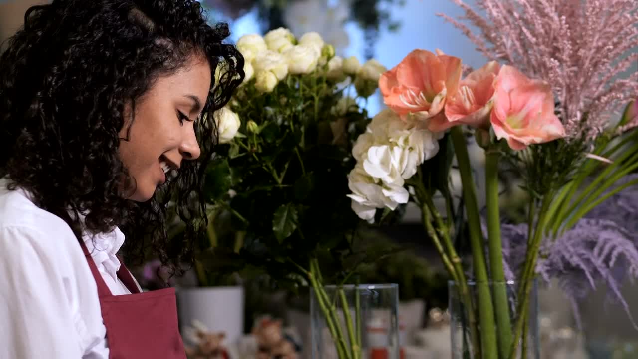 Download Stock Video Female Florist Working From A Tablet Live Wallpaper For PC