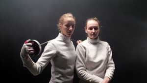 Stock Video Female Fencers Head On With A Dark Background Live Wallpaper For PC