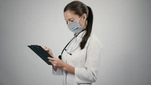 Stock Video Female Doctor Taking Notes Live Wallpaper For PC