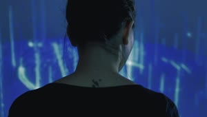 Stock Video Female Cyborg Watching To A Hologram Live Wallpaper For PC