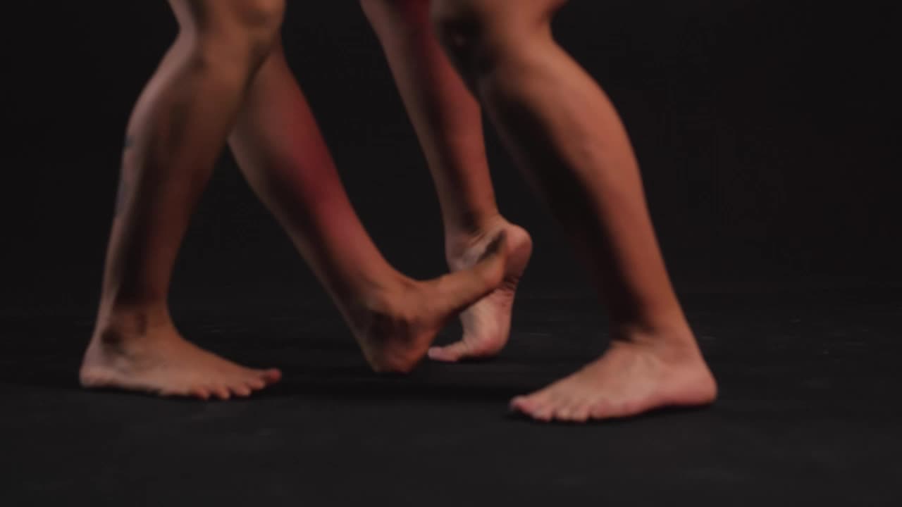 Download Stock Video Feet Of A Pair Of Women Dancing On A Dark Live Wallpaper For PC