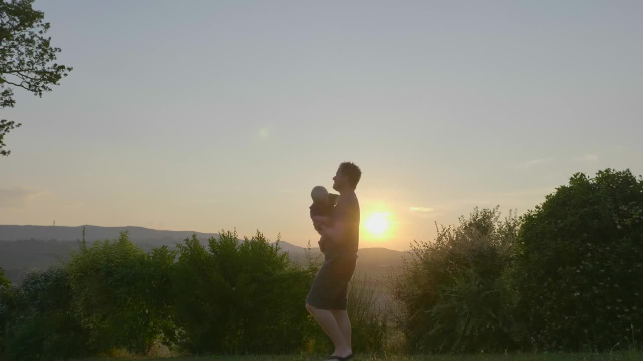 Download Stock Video Father Holding His Son Outside Live Wallpaper For PC