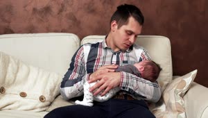 Stock Video Father Holding A Newborn Child Live Wallpaper For PC