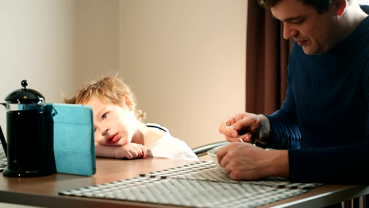 Download Stock Video Father Feeding His Young Son Live Wallpaper For PC
