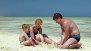Stock Video Father Building A Sand Castle With His Family Live Wallpaper For PC