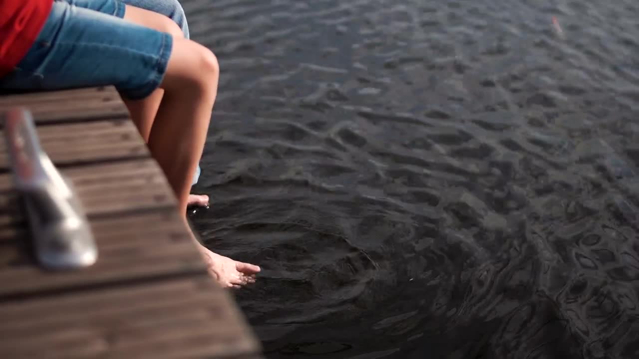 Download Stock Video Father And Son Sitting On The Pier Live Wallpaper For PC