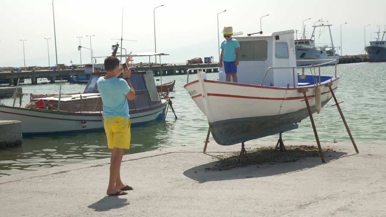 Download Stock Video Father And Son In A Small Harbor Live Wallpaper For PC