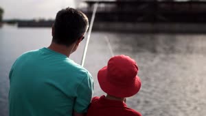 Stock Video Father And Son Fishing In The River Live Wallpaper For PC