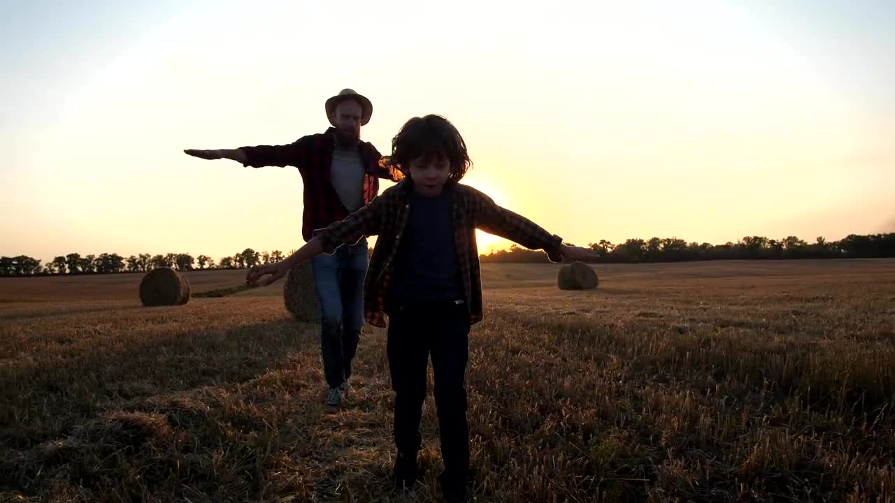 Download Stock Video Father And Son Flying Through A Field Live Wallpaper For PC
