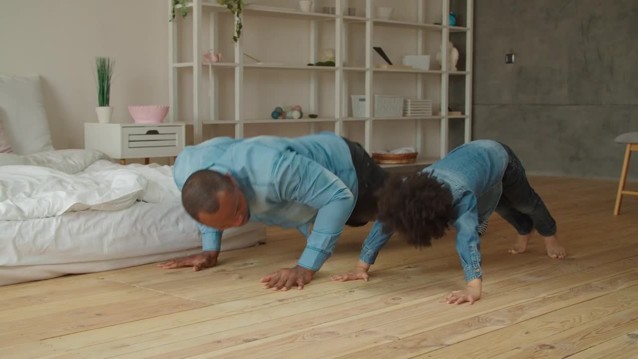 Download Stock Video Father And Son Doing Push Ups Together Live Wallpaper For PC