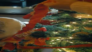 Stock Video Father And Mother Decorating A Christmas Tree Live Wallpaper For PC