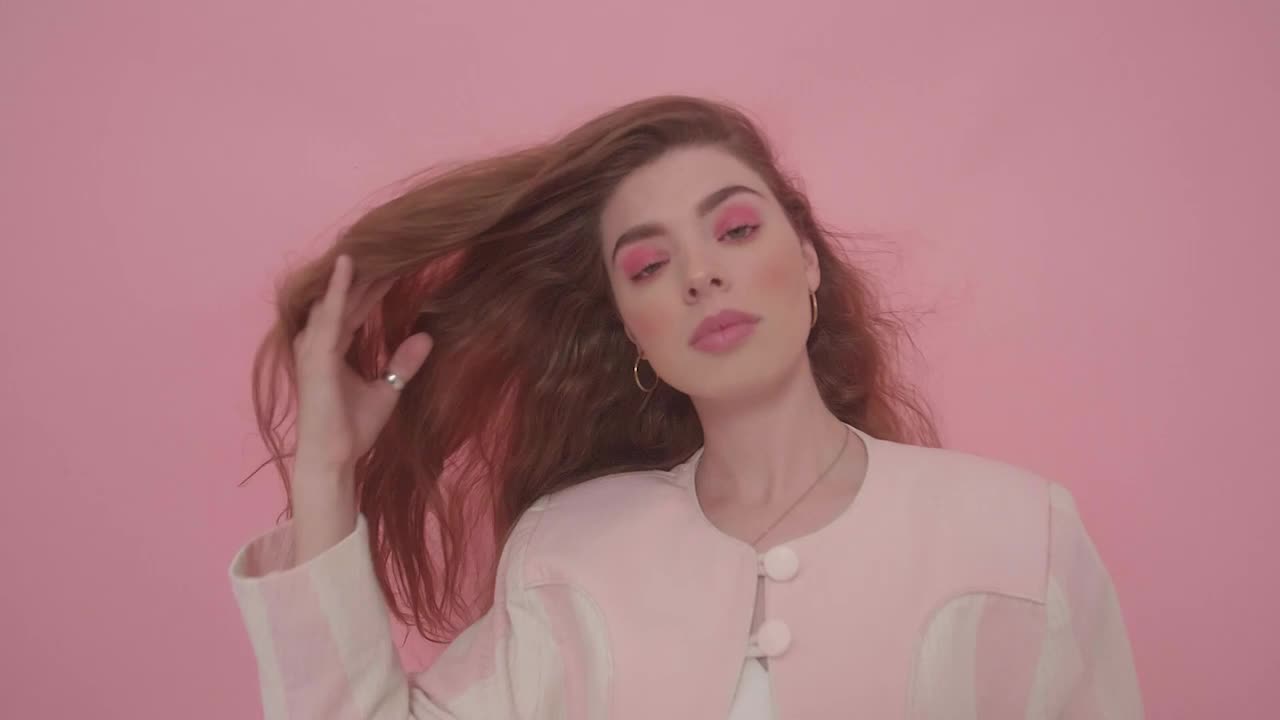 Download Stock Video Fashion Model On A Pink Background Live Wallpaper For PC