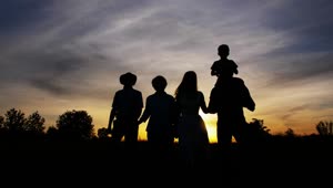 Stock Video Family Walking Together At Sunset Live Wallpaper For PC