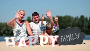 Stock Video Family Sitting Together On The Beach Live Wallpaper For PC