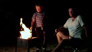 Stock Video Family Resting By A Campfire Live Wallpaper For PC