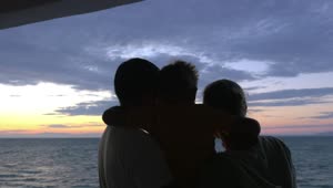 Stock Video Family Looking Out Over The Sea At Dusk Live Wallpaper For PC