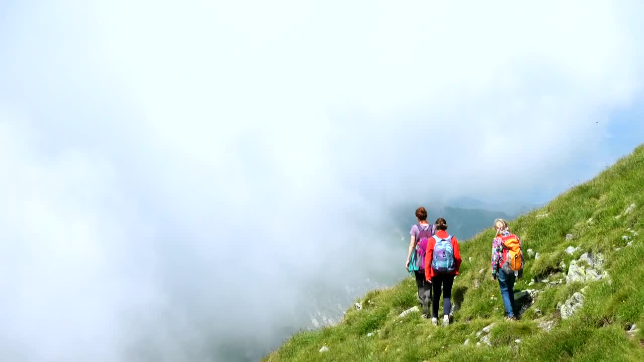 Download Stock Video Family Hiking In Misty Mountains Live Wallpaper For PC