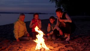 Stock Video Family Cooking Over A Campfire Live Wallpaper For PC