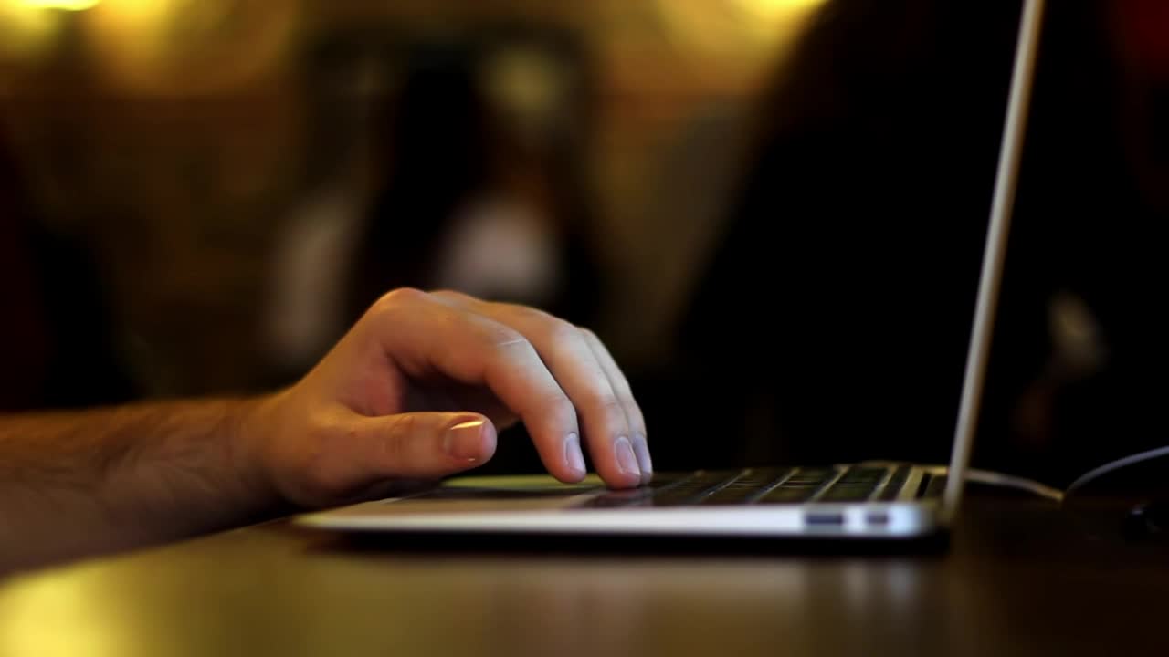 Download Stock Video Hand Of A Man Typing On A Laptop Live Wallpaper For PC