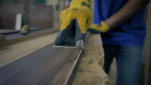 Stock Video Hand Of A Carpenter Leveling A Wooden Board Live Wallpaper For PC