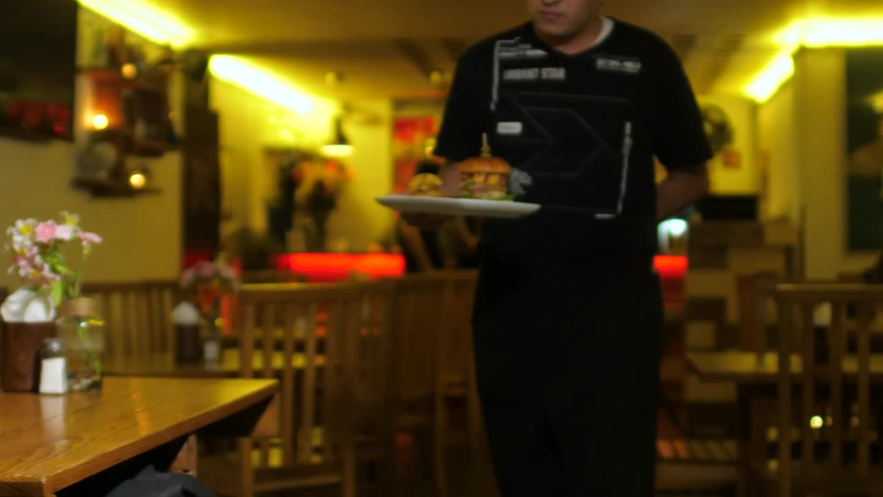 Download Stock Video Hamburger Being Served In Restaurant Live Wallpaper For PC