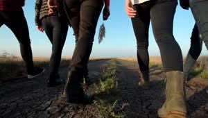 Stock Video Group Of People Walking On A Dirt Road Live Wallpaper For PC