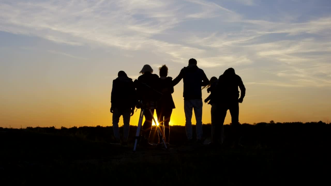 Download Stock Video Group Of Friends Watching The Sunset Together Live Wallpaper For PC