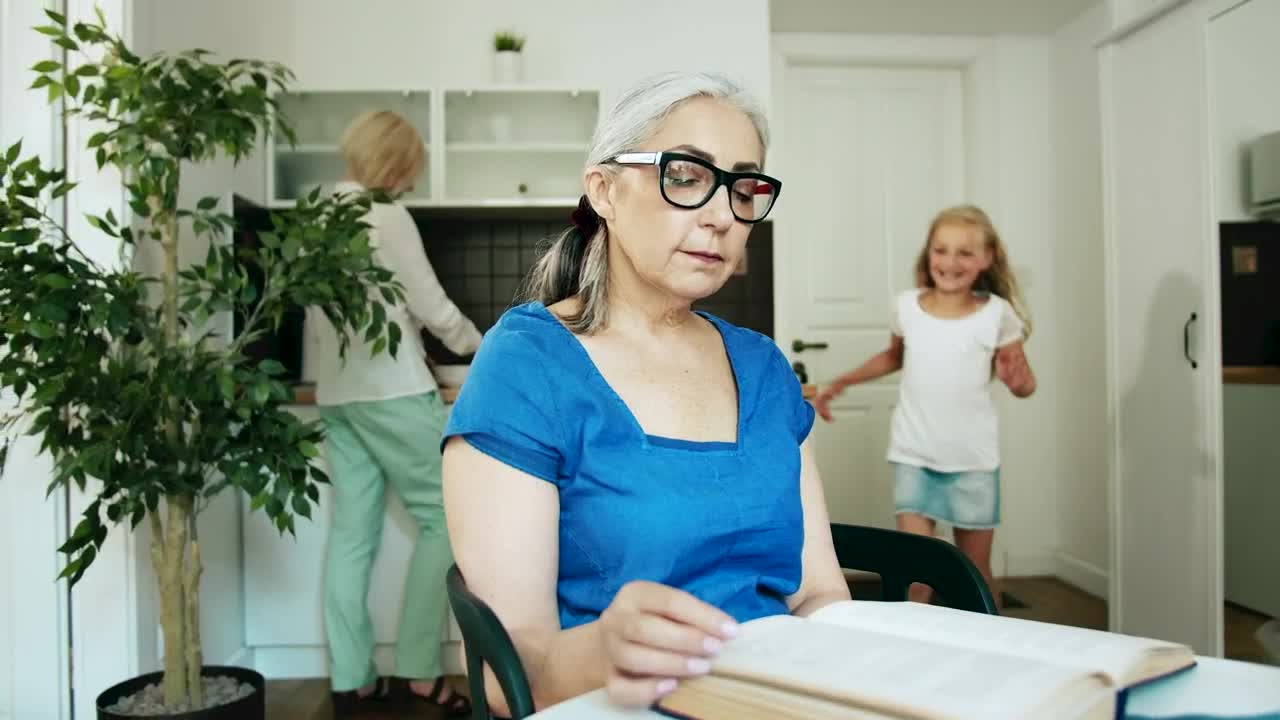 Download Stock Video Grandmother Receiving A Visit From Her Granddaughter Live Wallpaper For PC