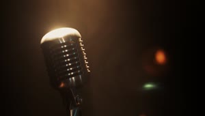 Stock Video Golden Glow On A Microphone Live Wallpaper For PC