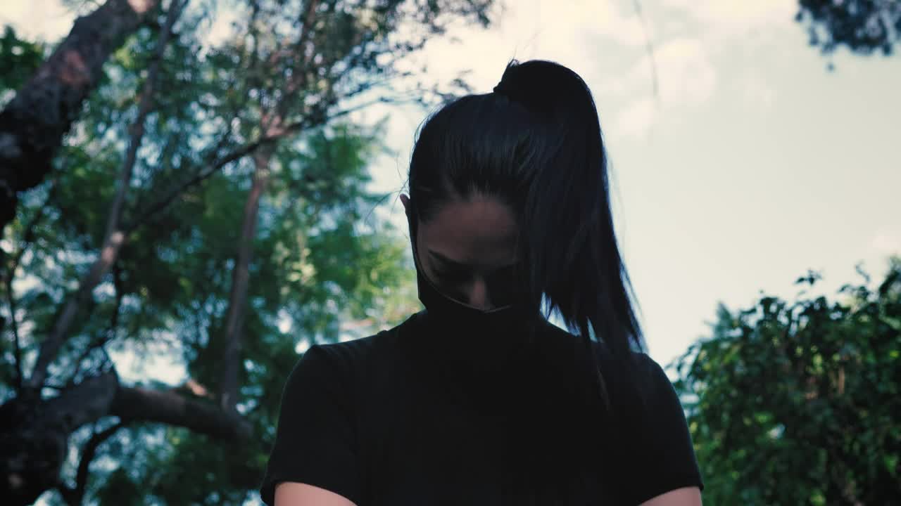 Download Stock Video Girl With Mask Warming Up And Stretching In Nature Live Wallpaper For PC